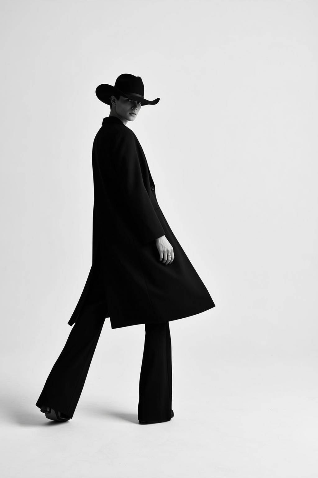 Full-body Medium Shot Black And White Photograph Captures Person With reference photo