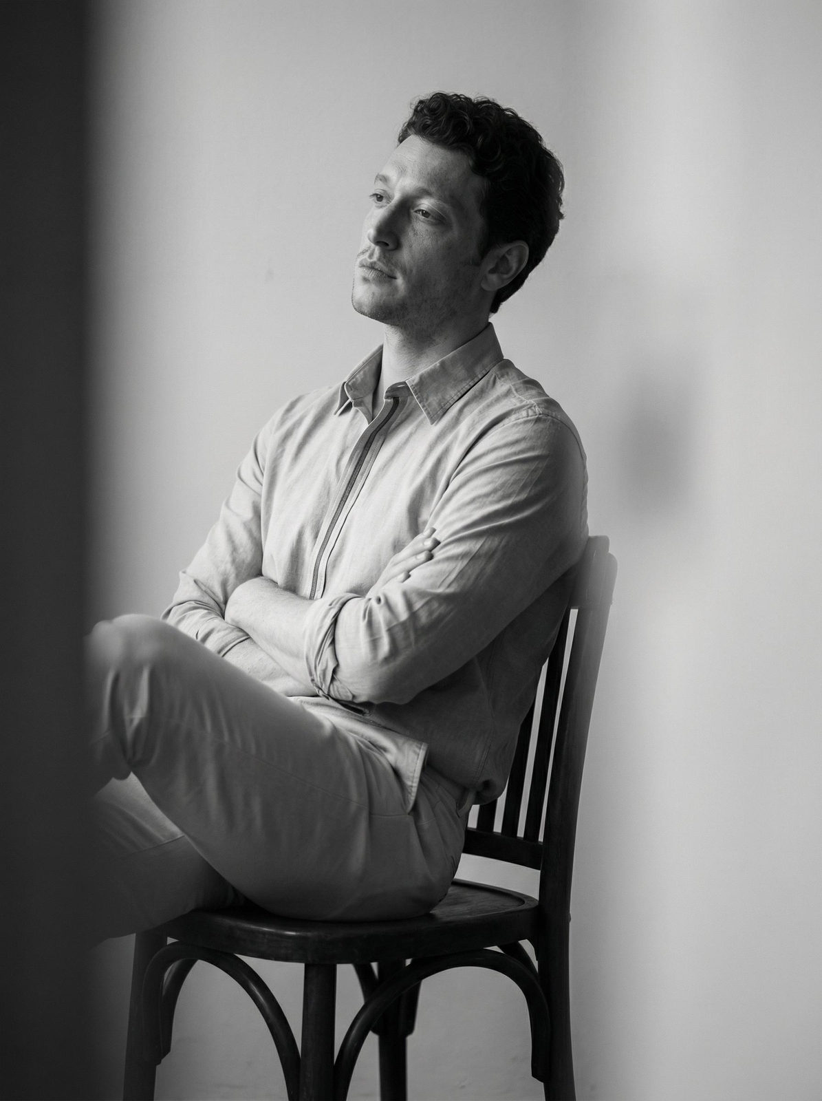 Man Seated Blurred Foreground Monochrome