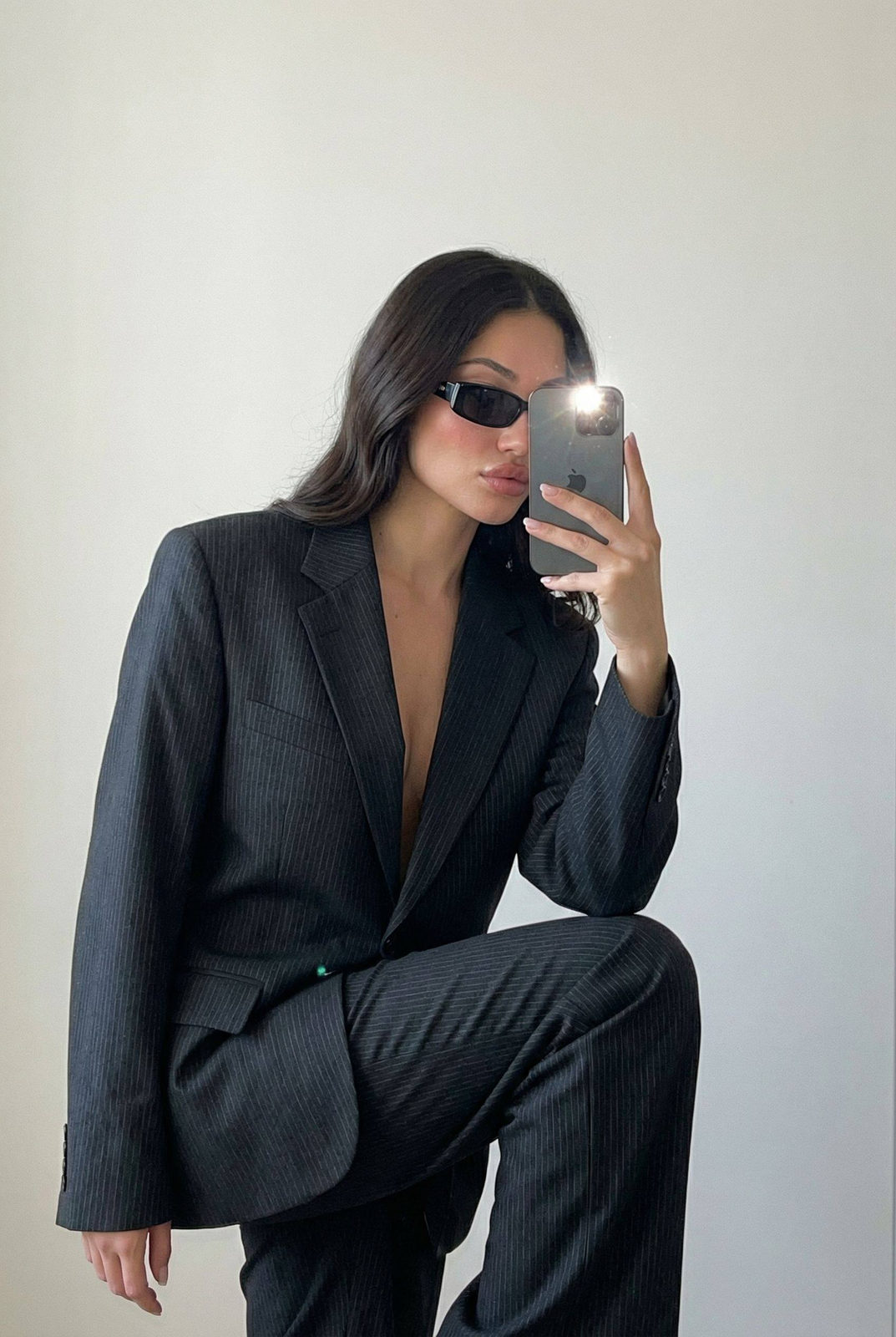 Woman Pinstripe Suit Mirror Selfie Minimal Wall