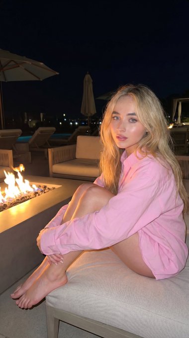 Pink Shirt Outdoor Bench Night Fire Pit Bokeh