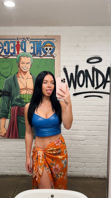 Tongue Out Blue Crop Top Floral Sarong Mirror Selfie