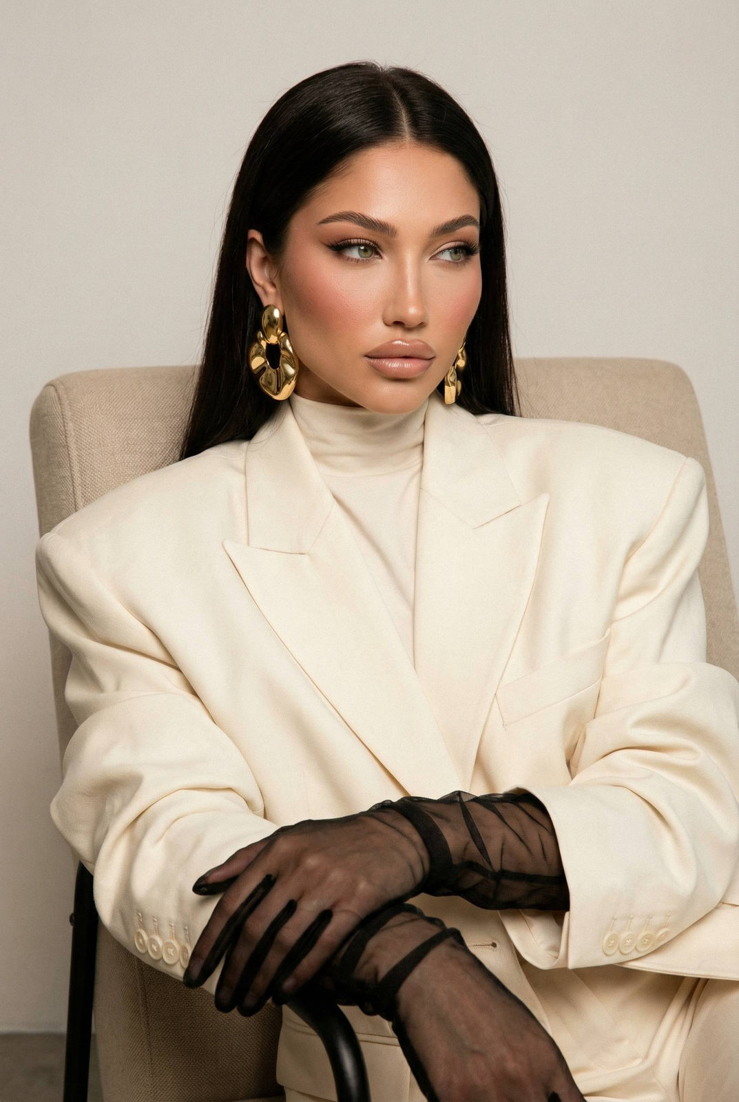 Elegant Woman Beige Armchair Studio Portrait