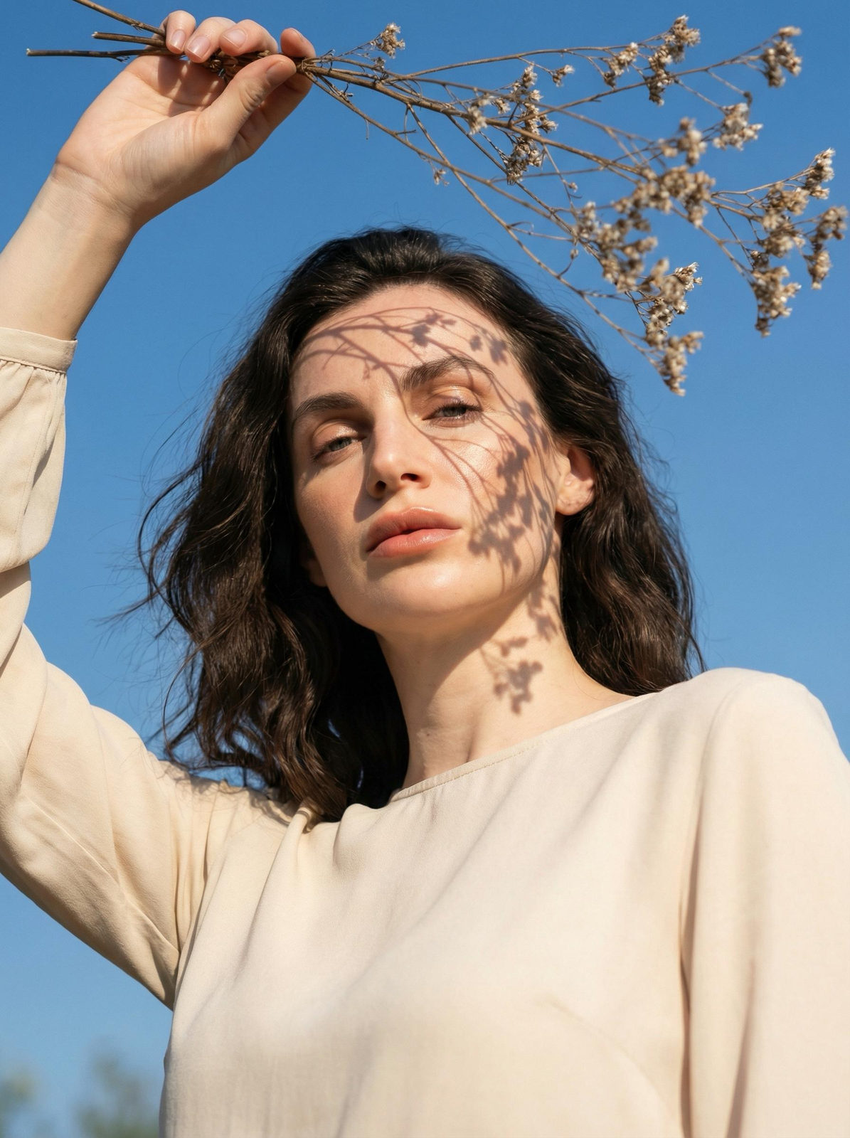 Low Angle Woman Dried Flower Shadow Portrait