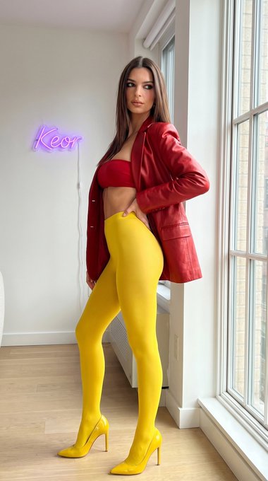 Red Blazer Yellow Tights Neon Sign Cityscape