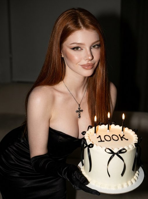 Black Satin Dress Holding Cake