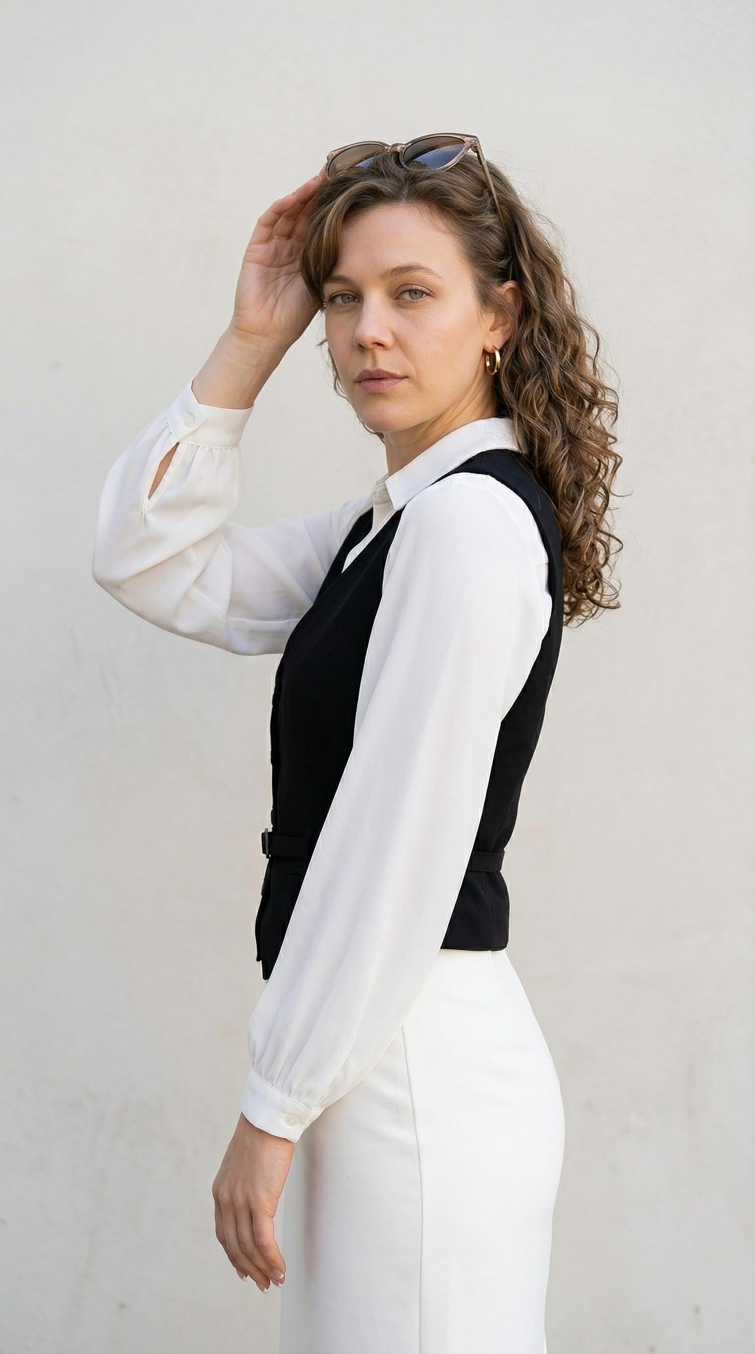 White Shirt Black Vest Minimalist Wall Waist Up