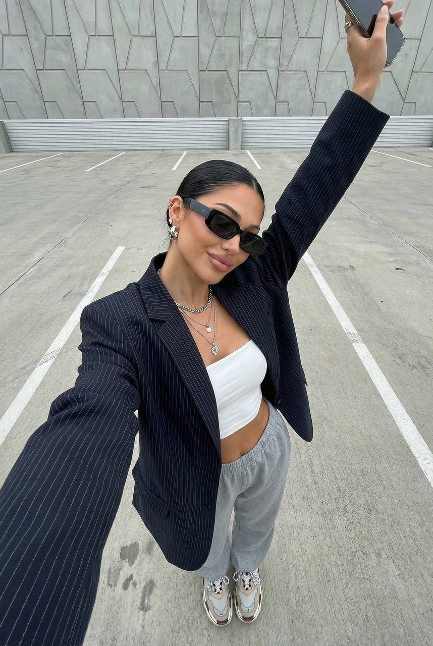 Fashionable Woman Wide Angle Selfie Urban Parking Lot