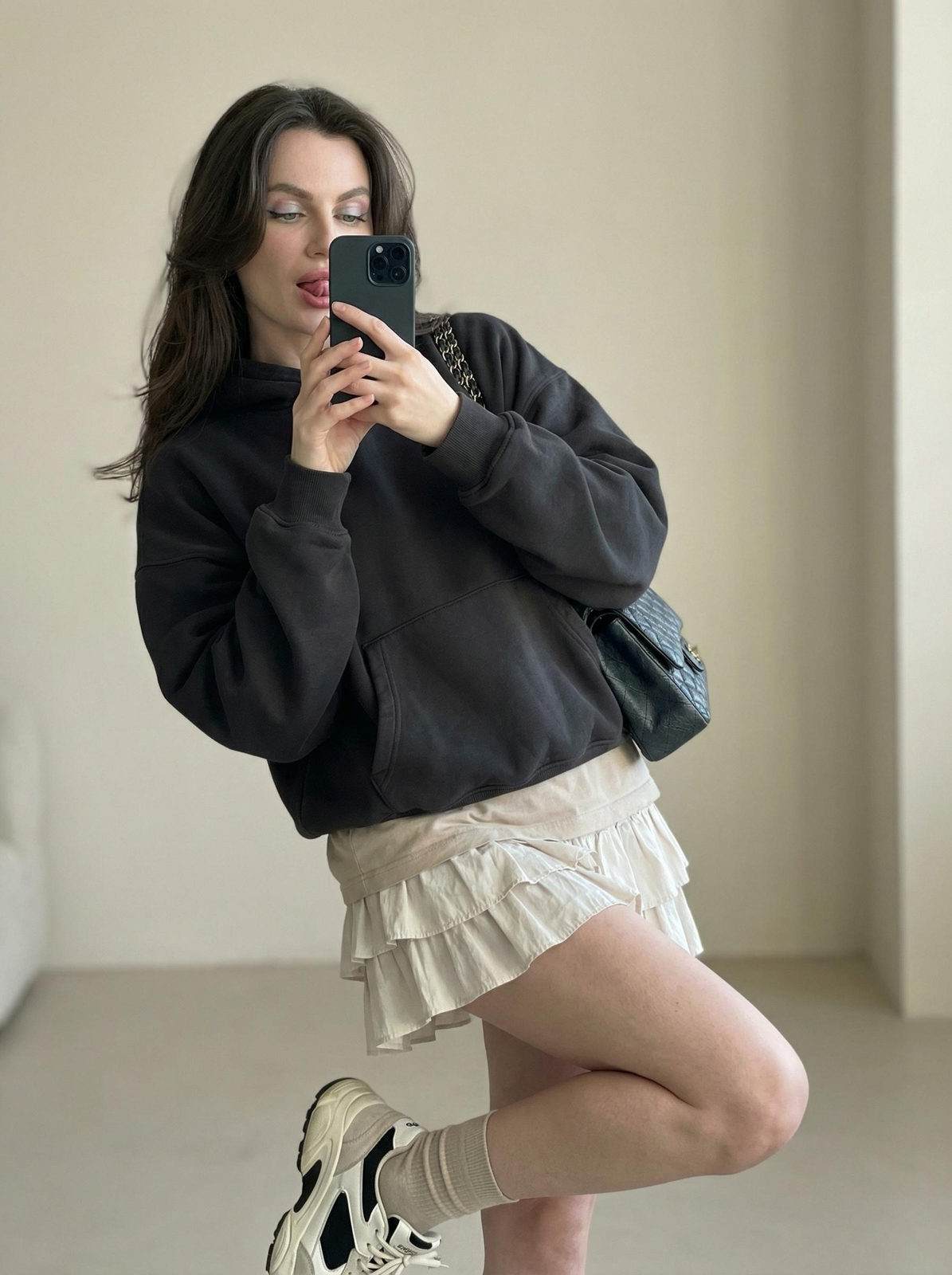 Playful Mirror Selfie Pose With Pastel Eyeshadow