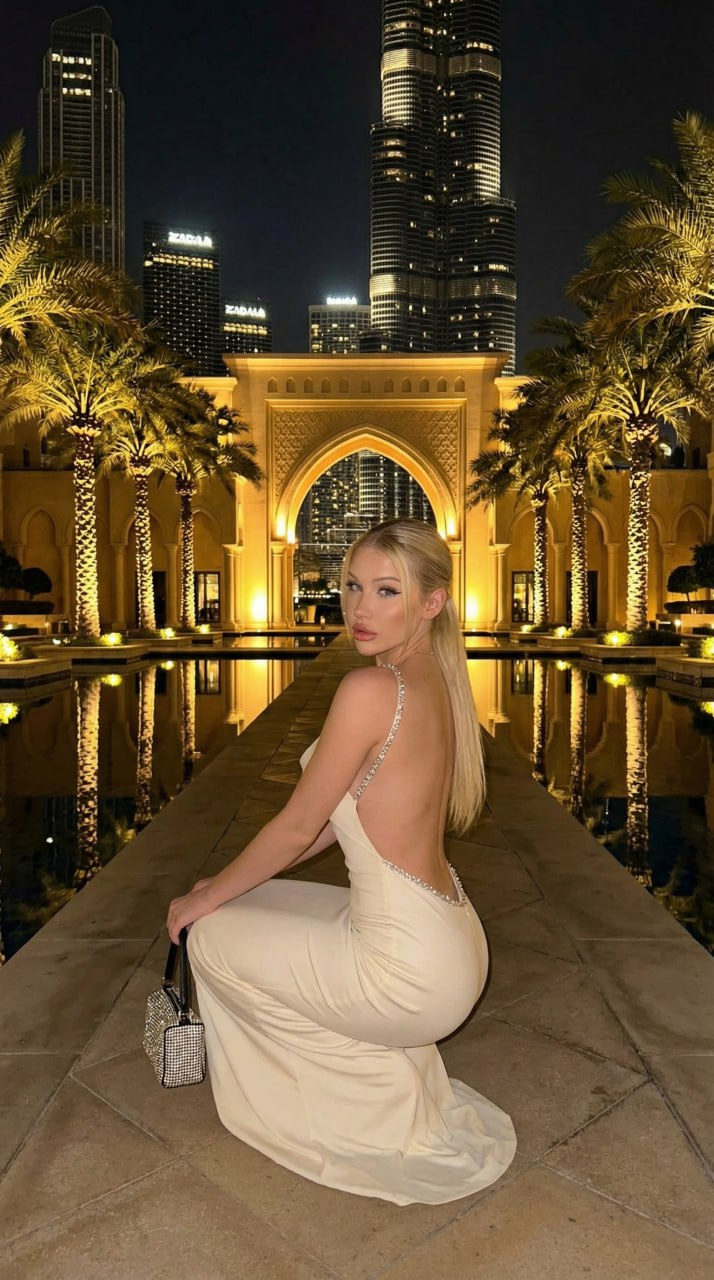 Dubai Night Fashion Portrait Crouching