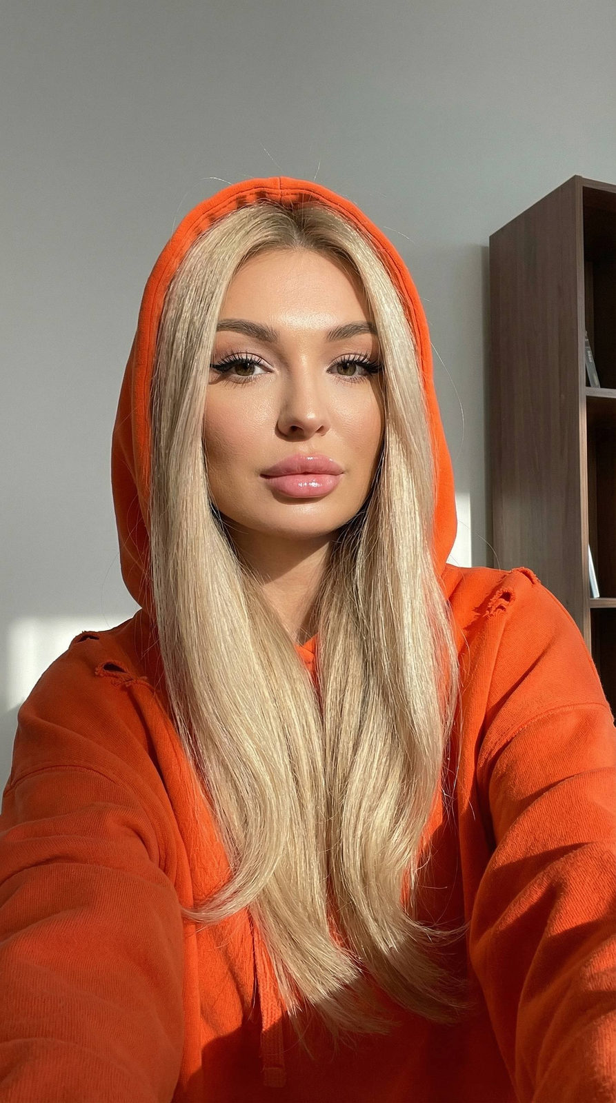 Realistic Orange Hoodie Selfie High Contrast