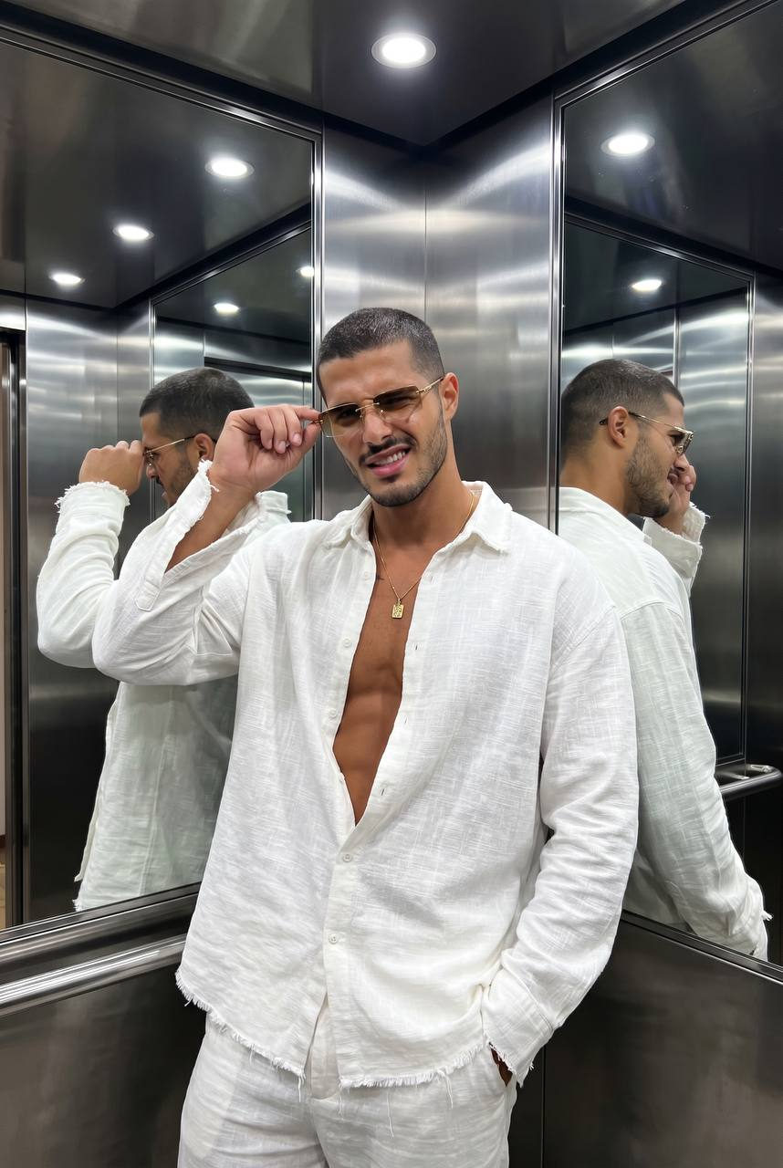 Young Muscular In Luxury Hotel Elevator With Mirrored