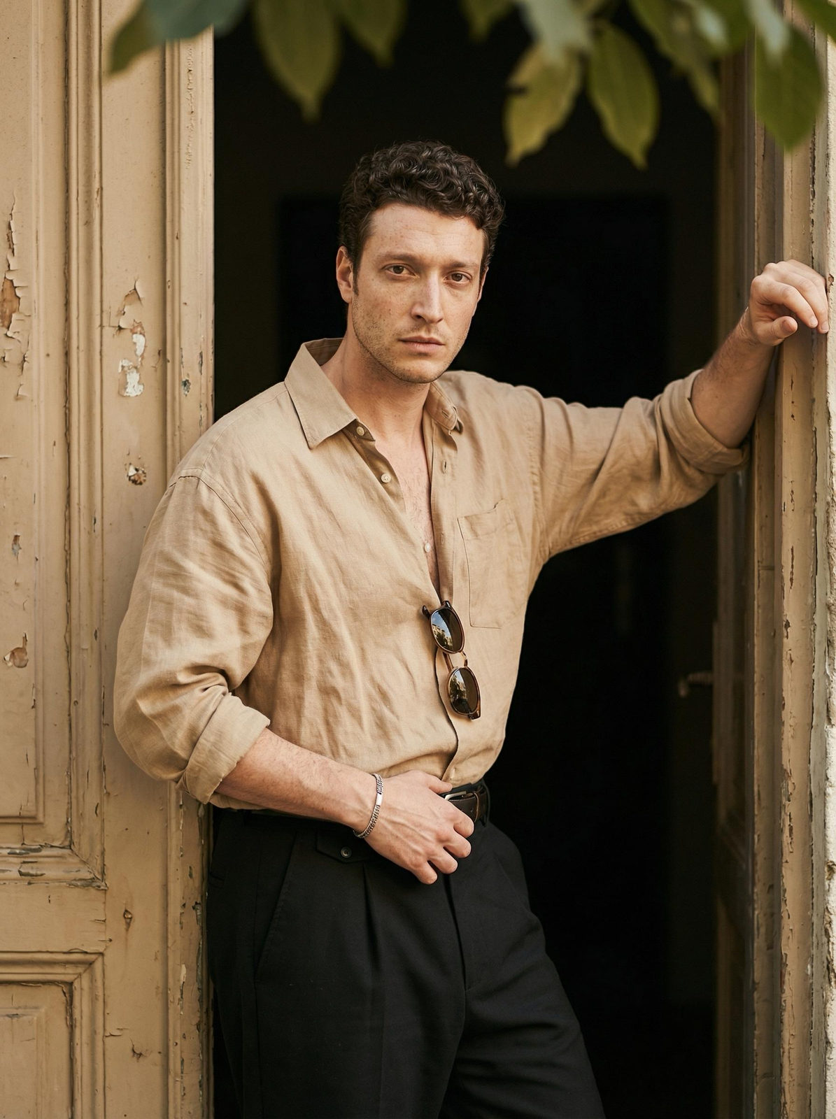 Doorway Beige Shirt Dark Pants Sunglasses