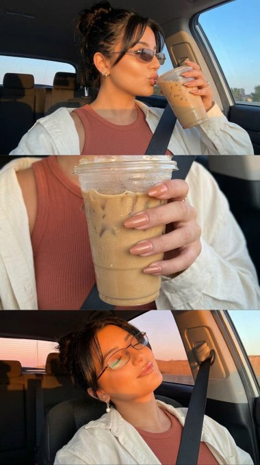 Woman in silver glasses sipping iced coffee in a car