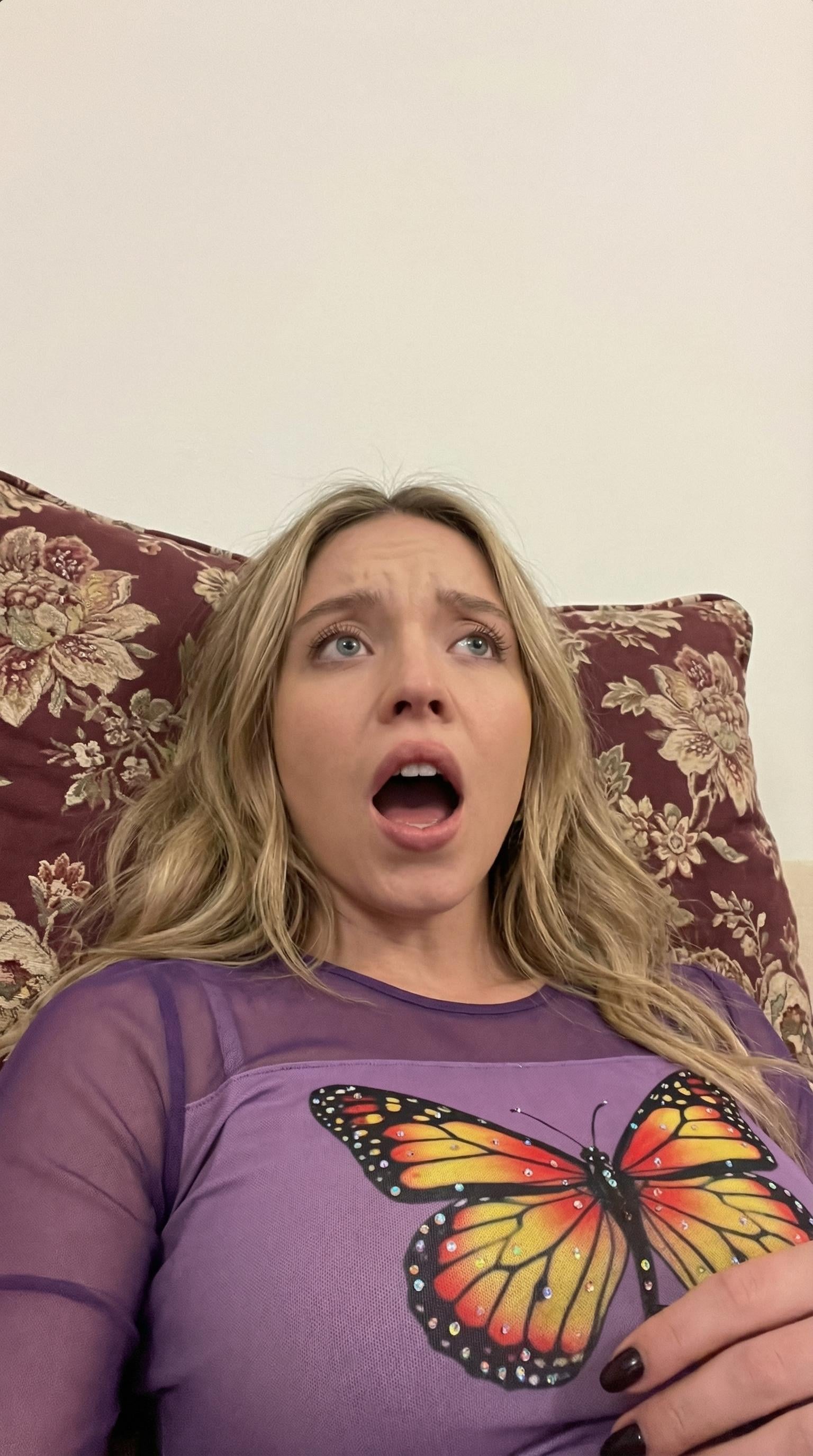 Shocked Woman Butterfly Top Low Angle