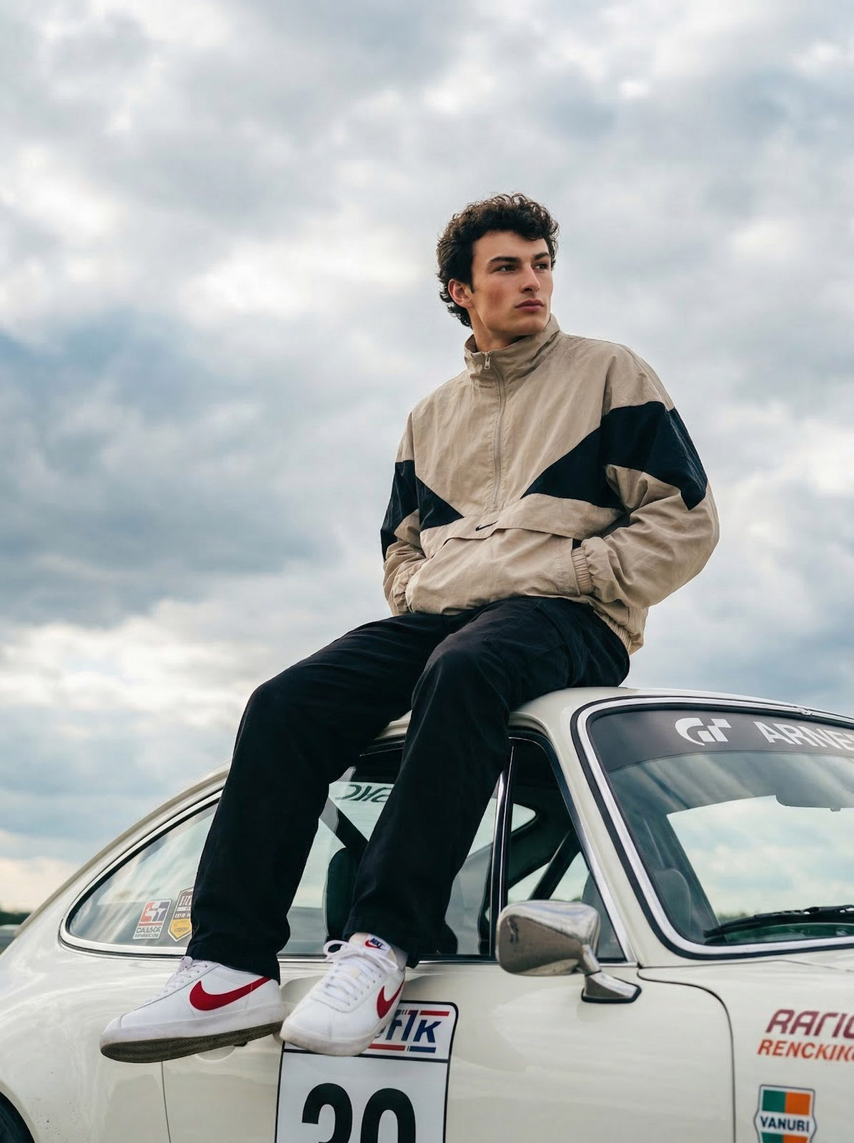 Young Man Car Roof Cloudy Sky Cinematic