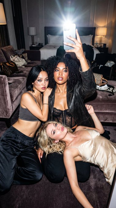 Dim Hotel Room Three People Satin Pants Lace Bralette