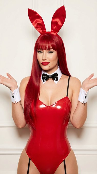 Red Latex Bunny Outfit Offering Pose Soft Light