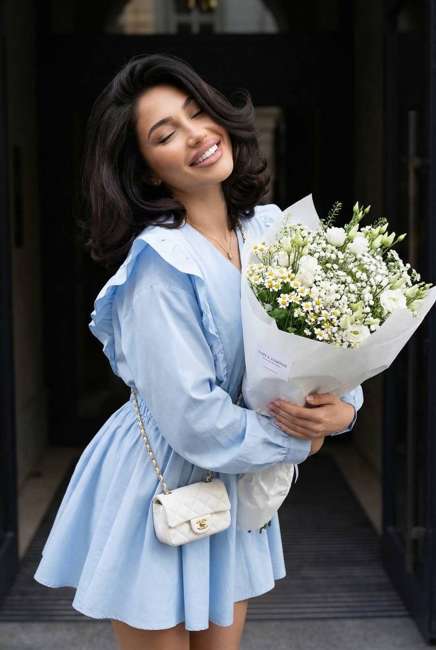Pastel Blue Dress Holding White Flowers Outdoor