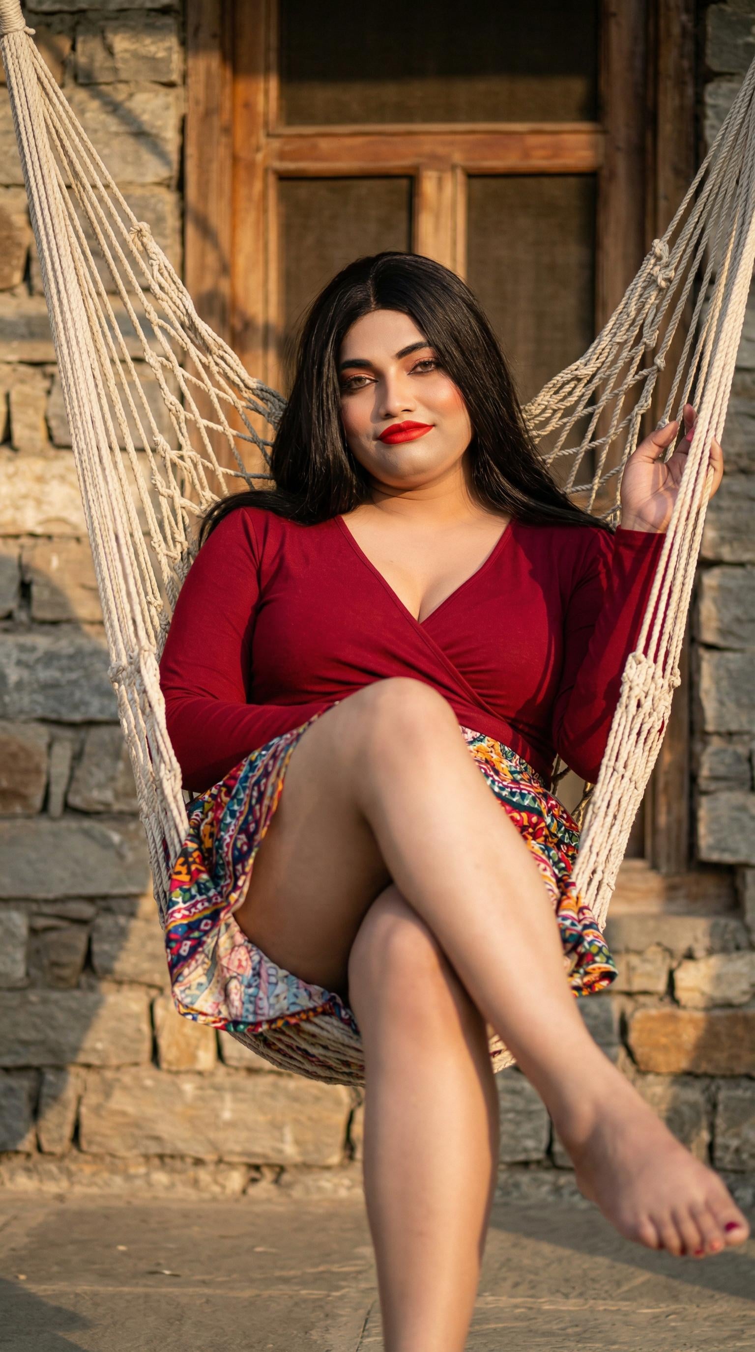Red Wrap Top Geometric Skirt Macrame Hammock Stone Wall