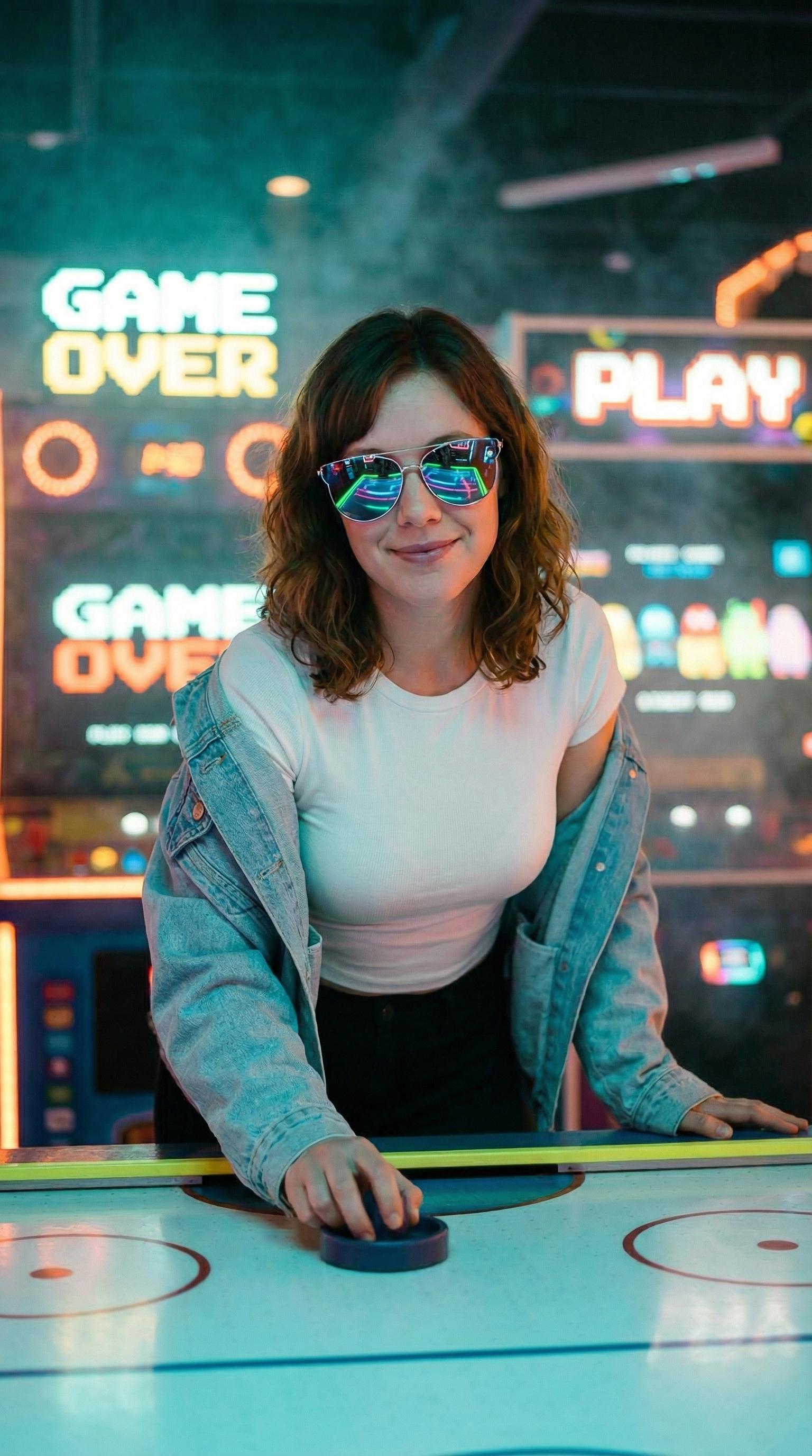 Neon Arcade Air Hockey Woman Confident Playful Pose