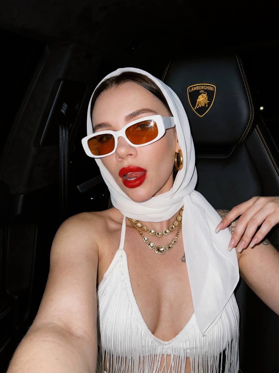 Woman Car Interior Orange Sunglasses