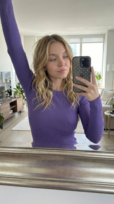 Taking Mirror Selfie Relaxed Confident Pose
