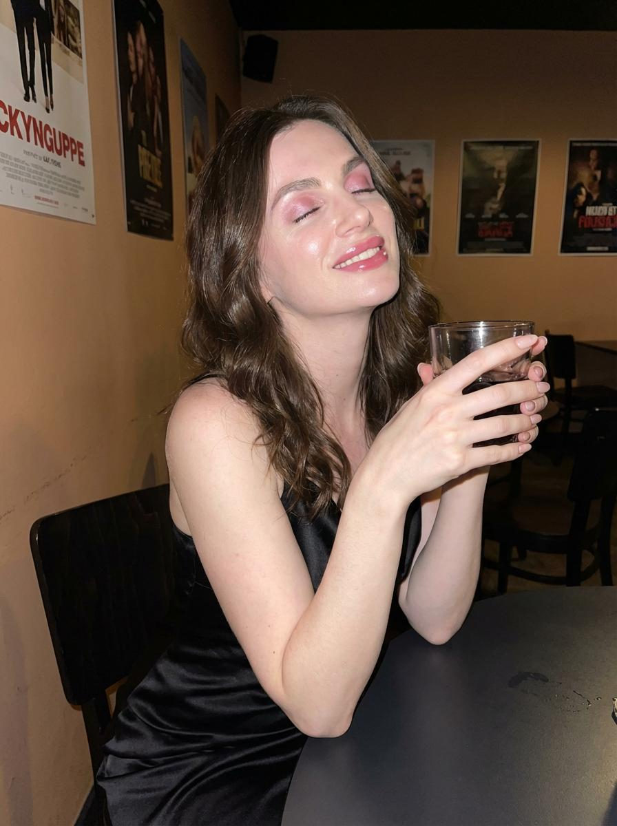 Seated Table Holding Drink Soft Glow