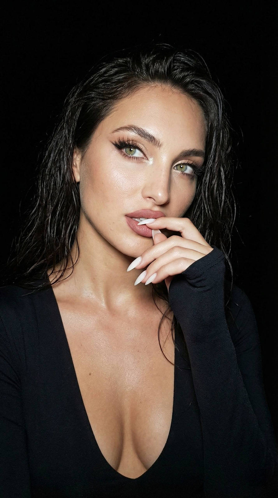 Confident Woman Hand To Face
