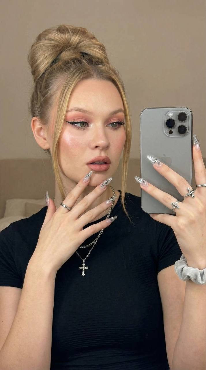 Selfie Mirror High Bun Stiletto Nails