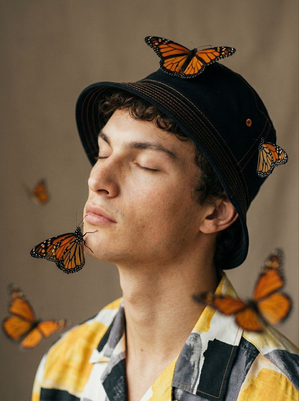 Young Man Monarch Butterflies Portrait