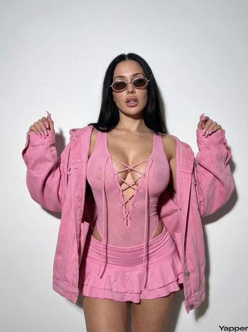 Pink Denim Jacket Lace Bodysuit White Wall Pose