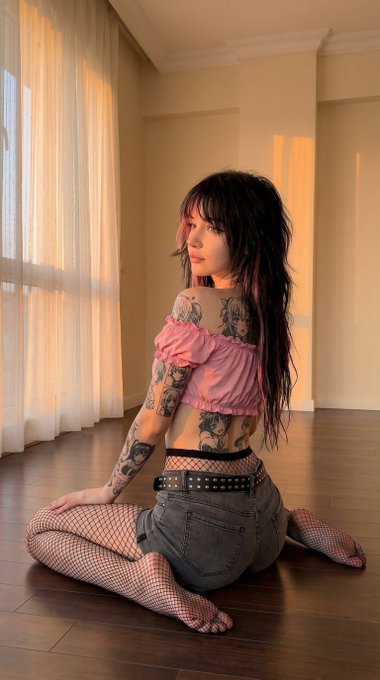 Sunset Glow Woman On Dark Wood Floor