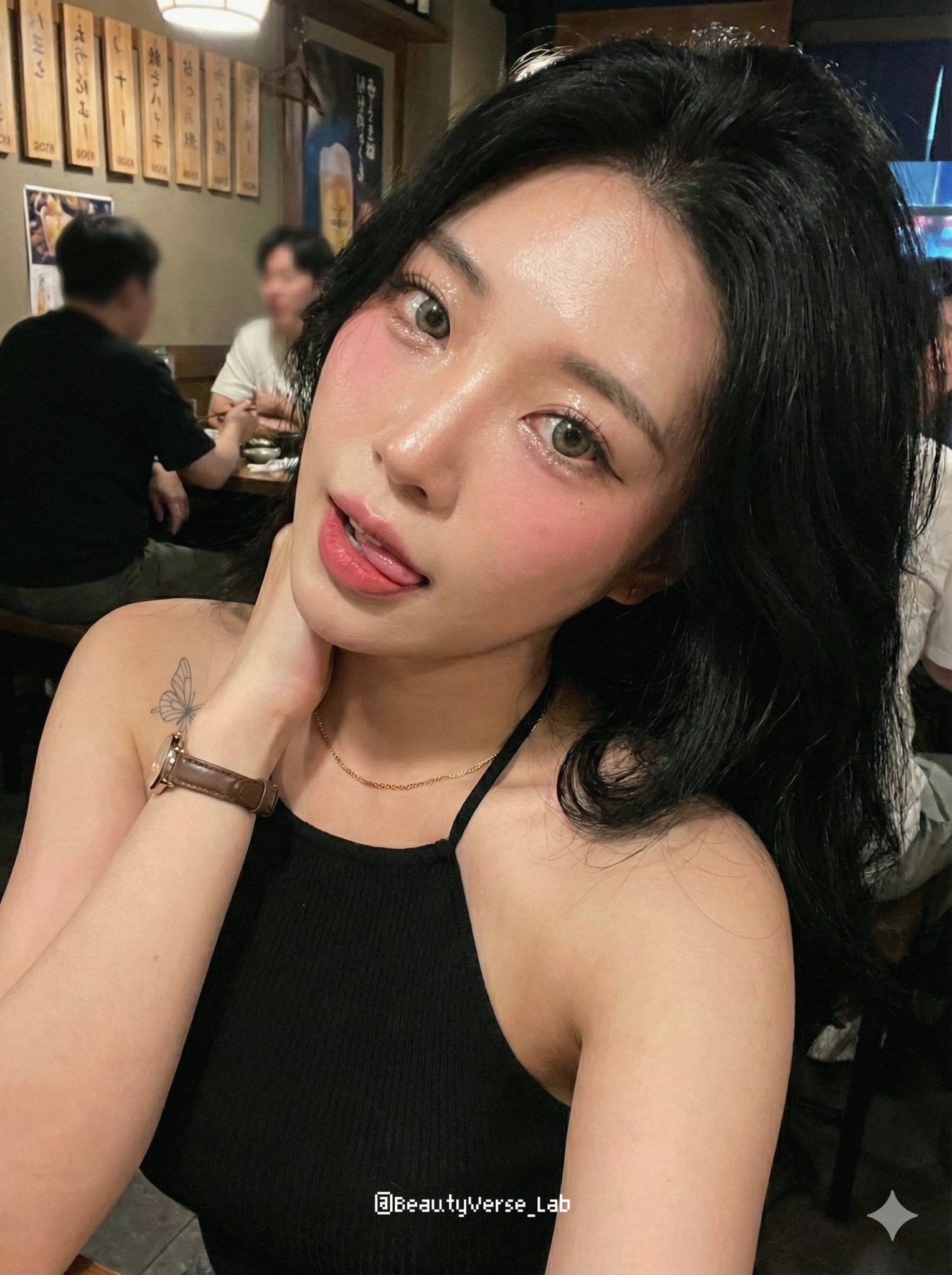 Close-up selfie portrait of a stunning East Asian woman with radiant skin and sultry expression, wearing glamorous makeup indoors.