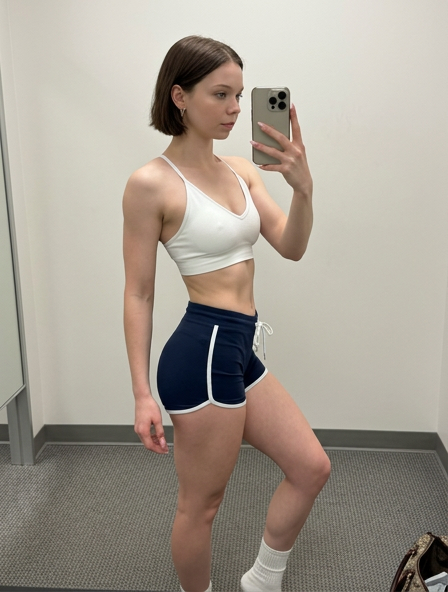 Fitting Room Mirror Selfie White Sports Bra Athletic Shorts