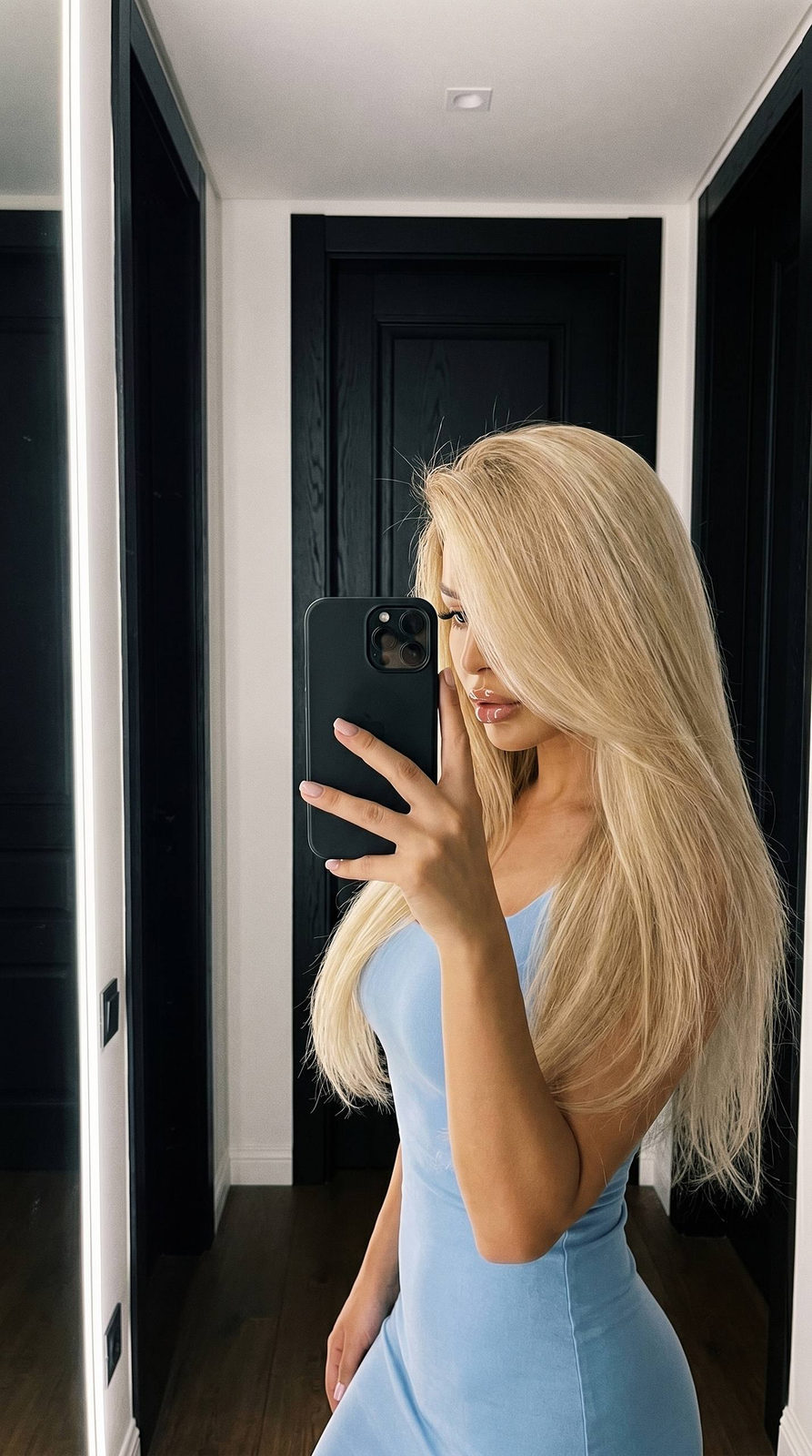 Blue Dress Selfie In Hallway With White Light