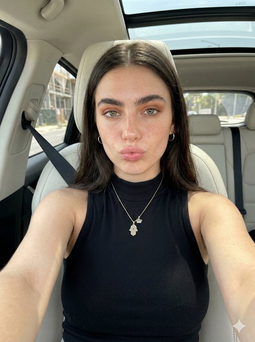 Car Selfie Bright Daylight Pursed Lips Gold Necklace