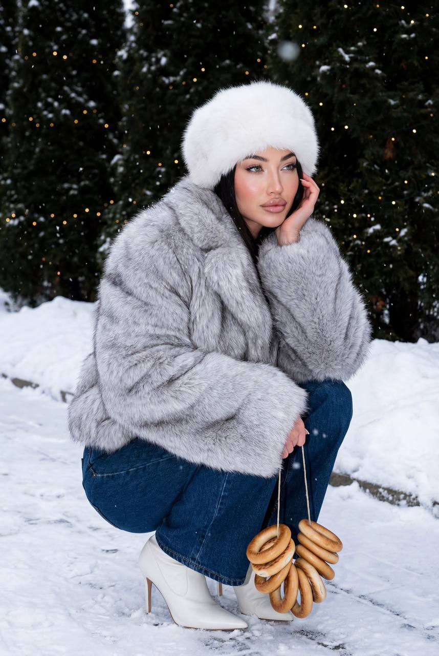 Fashionable Woman Snowy Pathway Fairy Lights Bagels