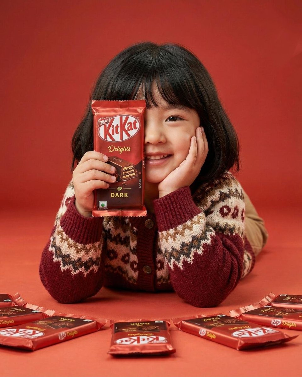 Girl Holding Kitkat Red Table Studio Lighting