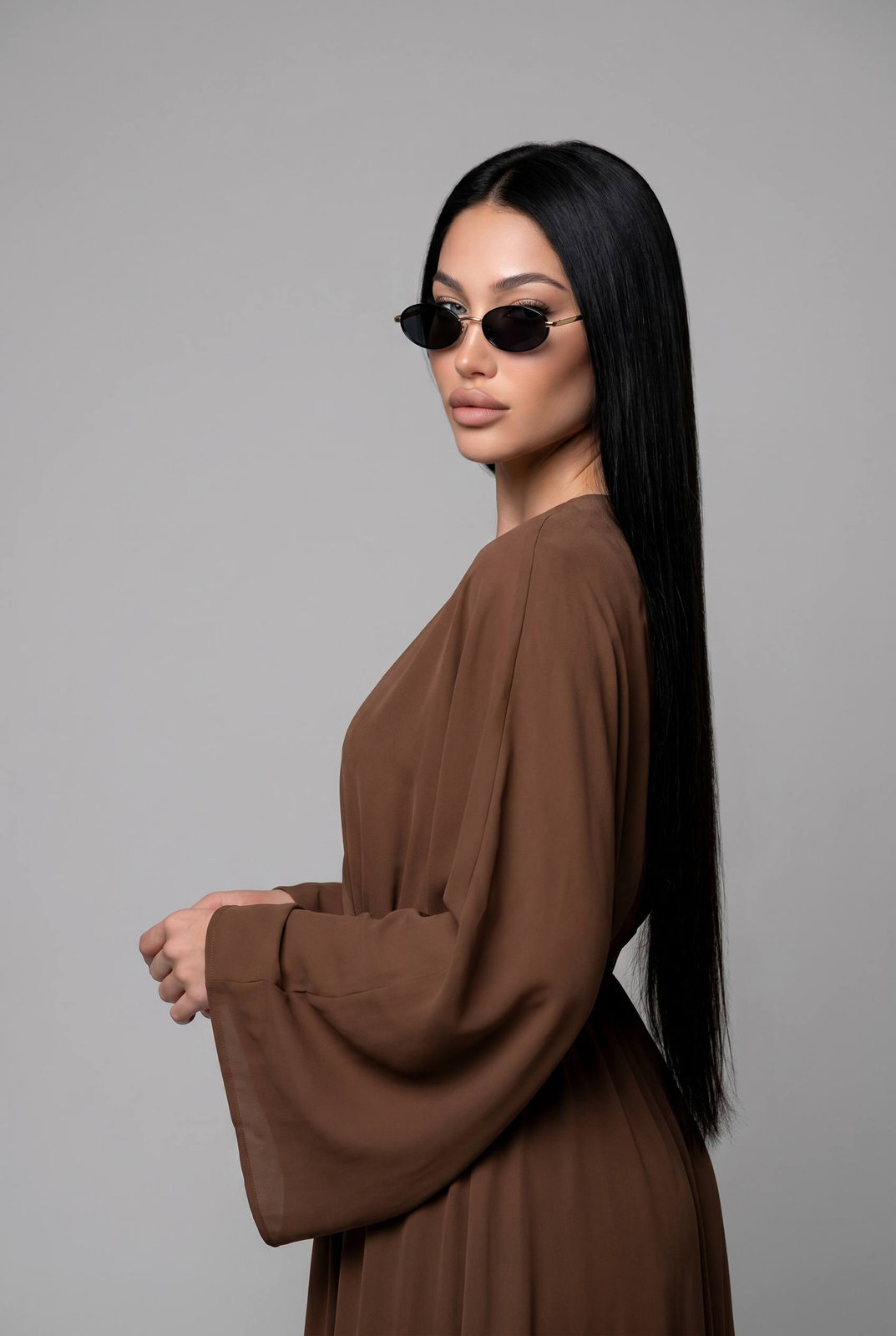 Brown Dress Oval Sunglasses Gray Studio Side Profile